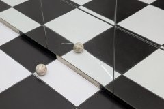 Eine gebrochene Spiegelfliese